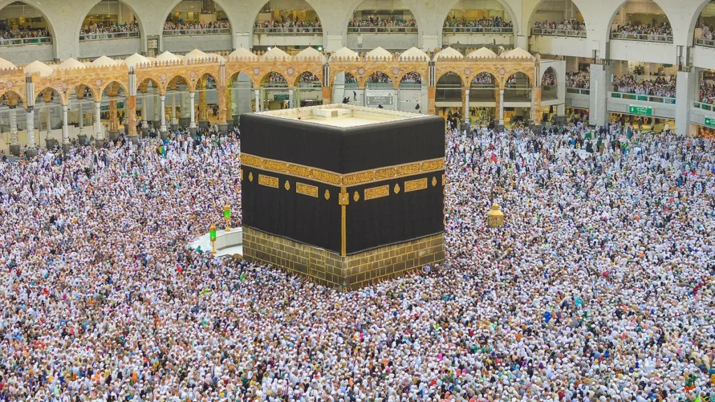 Pilgrims walking around the Kaaba in the Mataf of Masjid al-Haram in Makkah